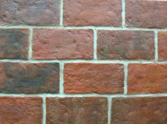 warm red tones of our standard brick tiles. (Lancaster Running Bond